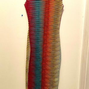 See though short Dress… Can be worn with Leggings, a body Suit… Or as is…